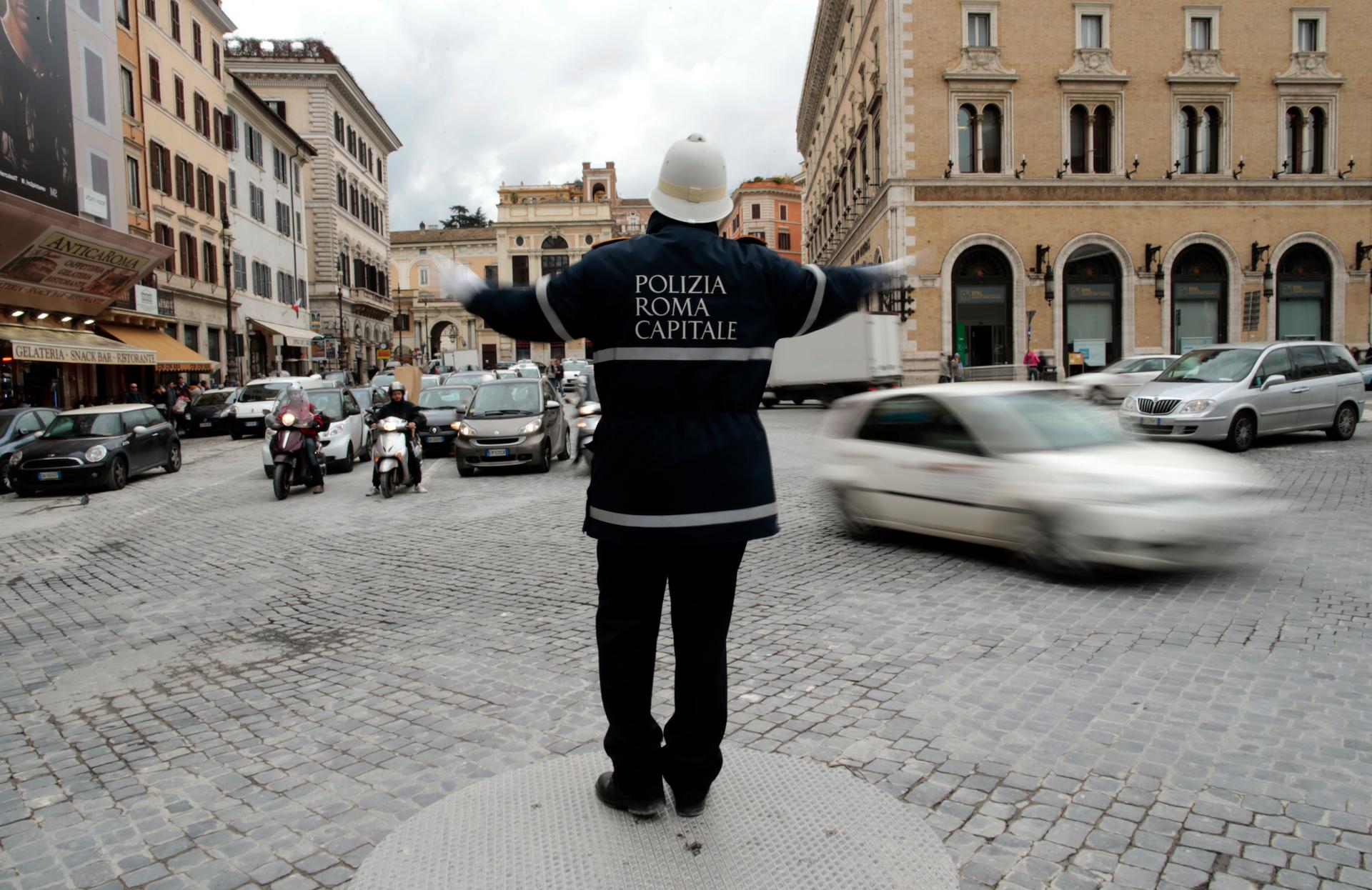 A police man directs traffic in Italy