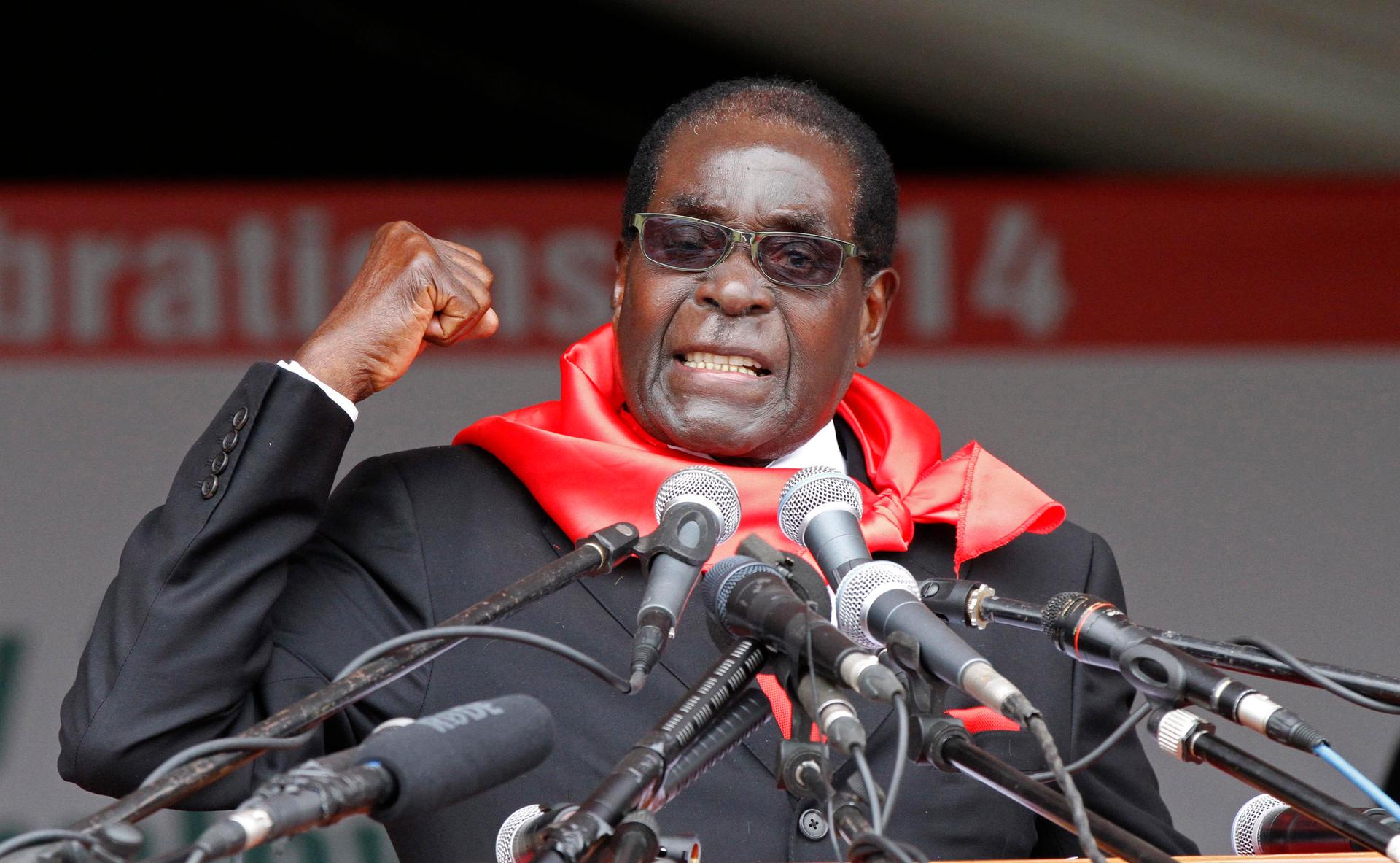 Zimbabwe President Robert Mugabe addresses supporters during celebrations to mark his 90th birthday in Marondera 