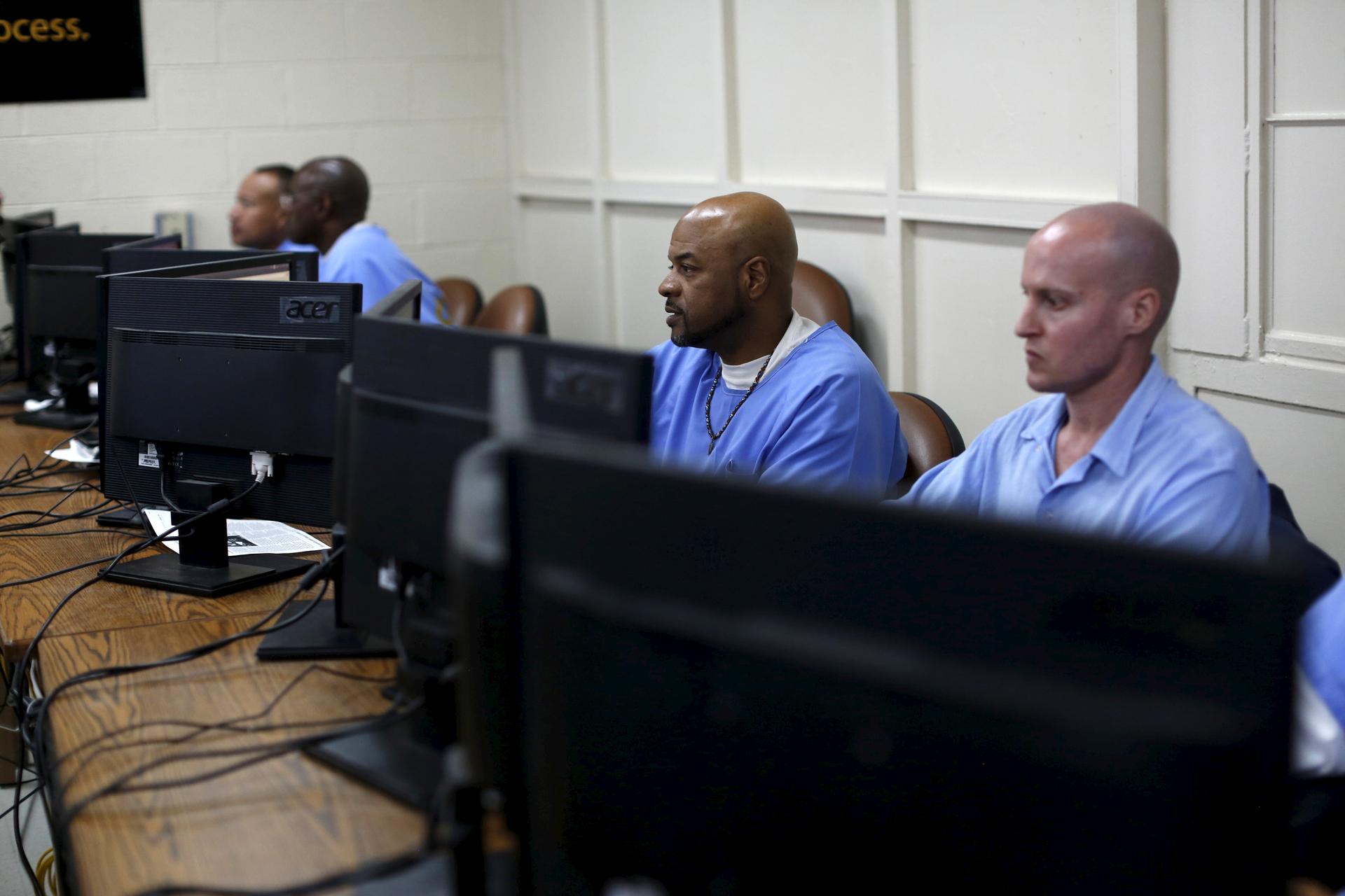 Graduates of a prison computer coding class at work inside San Quentin, in California.