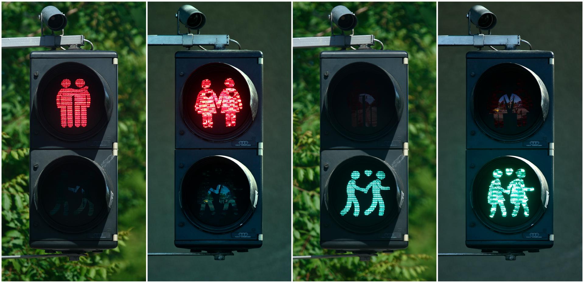 New traffic lights in Vienna show male and  female gay couples with hearts - in red for stop and green for go