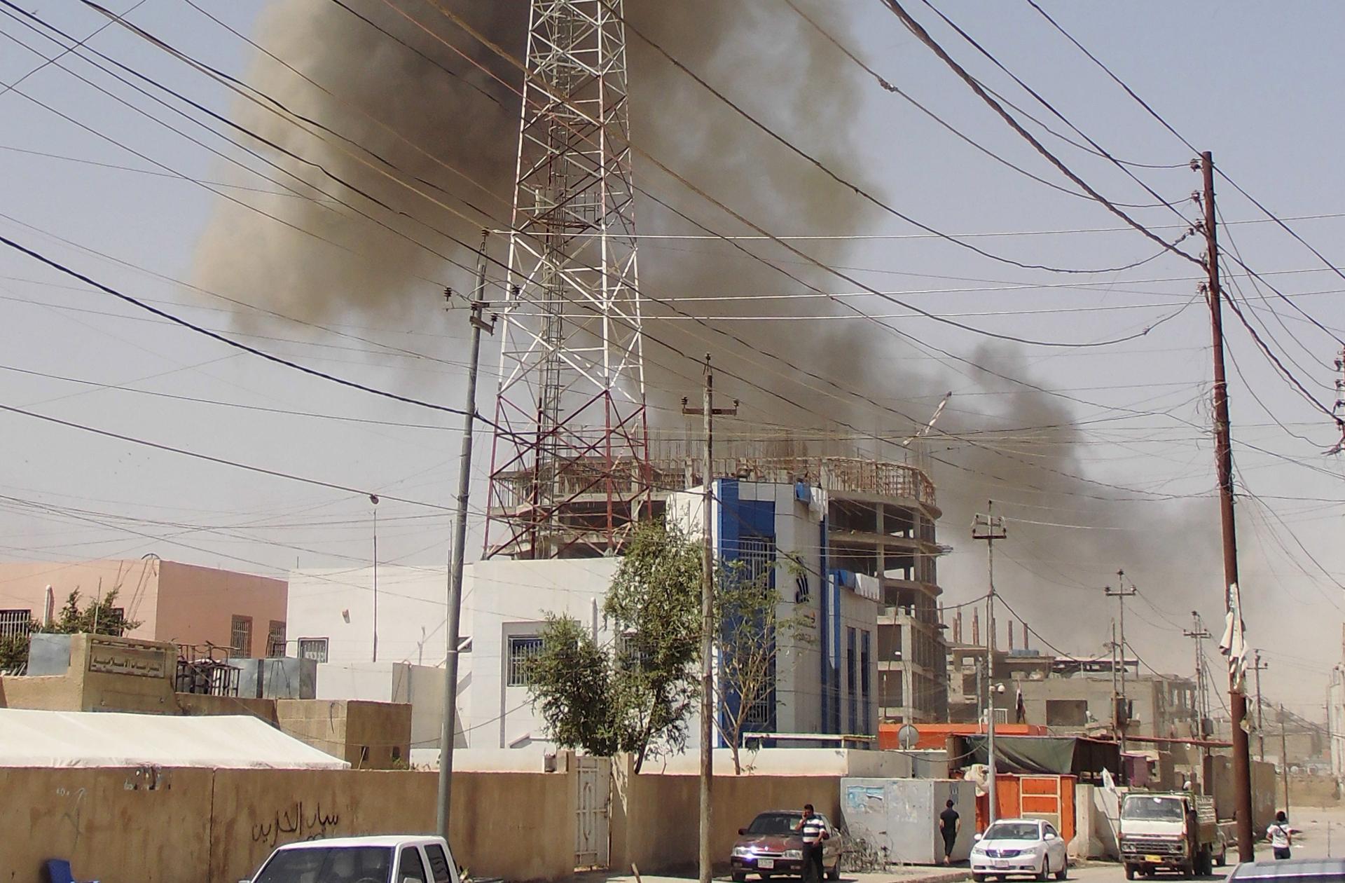 Smoke rises after a bomb attack in the city of Ramadi, May 15, 2015.