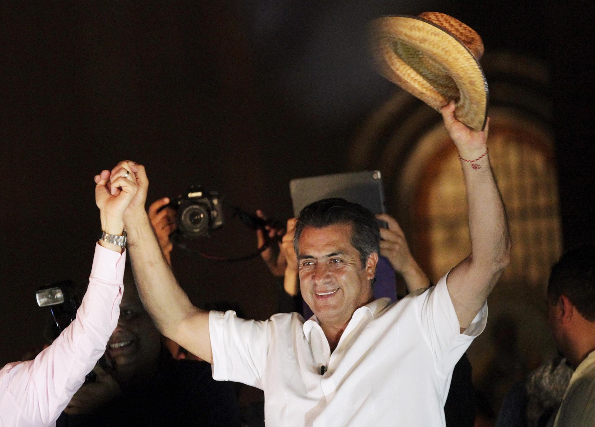 Jaime Rodriguez, known as “El Bronco,” an independent candidate for governor of Nuevo Leon state, celebrates his victory after midterm elections, June 7, 2015.