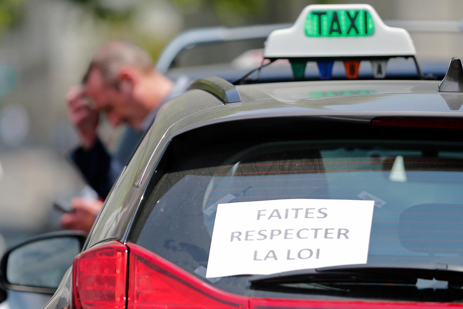 French taxi drivers protest against Uber