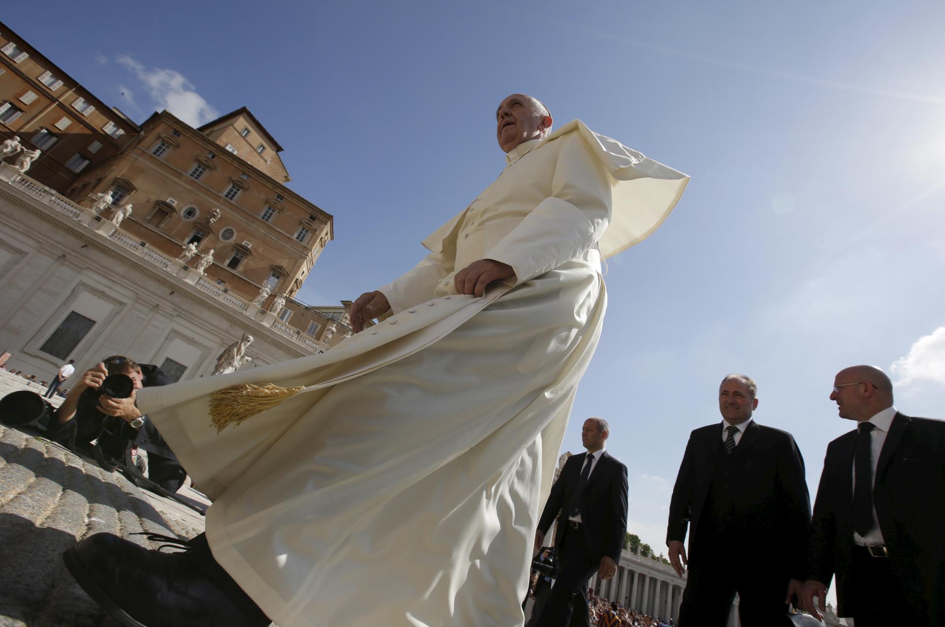 Pope Francis arrives to lead his Wednesday general audience in Saint Peter's square at the Vatican in Rome on June 17, 2015.