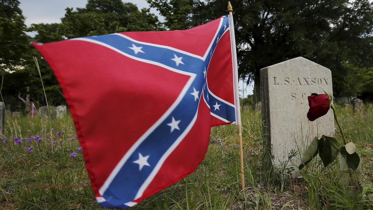 A Confederate battle flag flies at the grave of a Confederate Civil War soldier in South Carolina