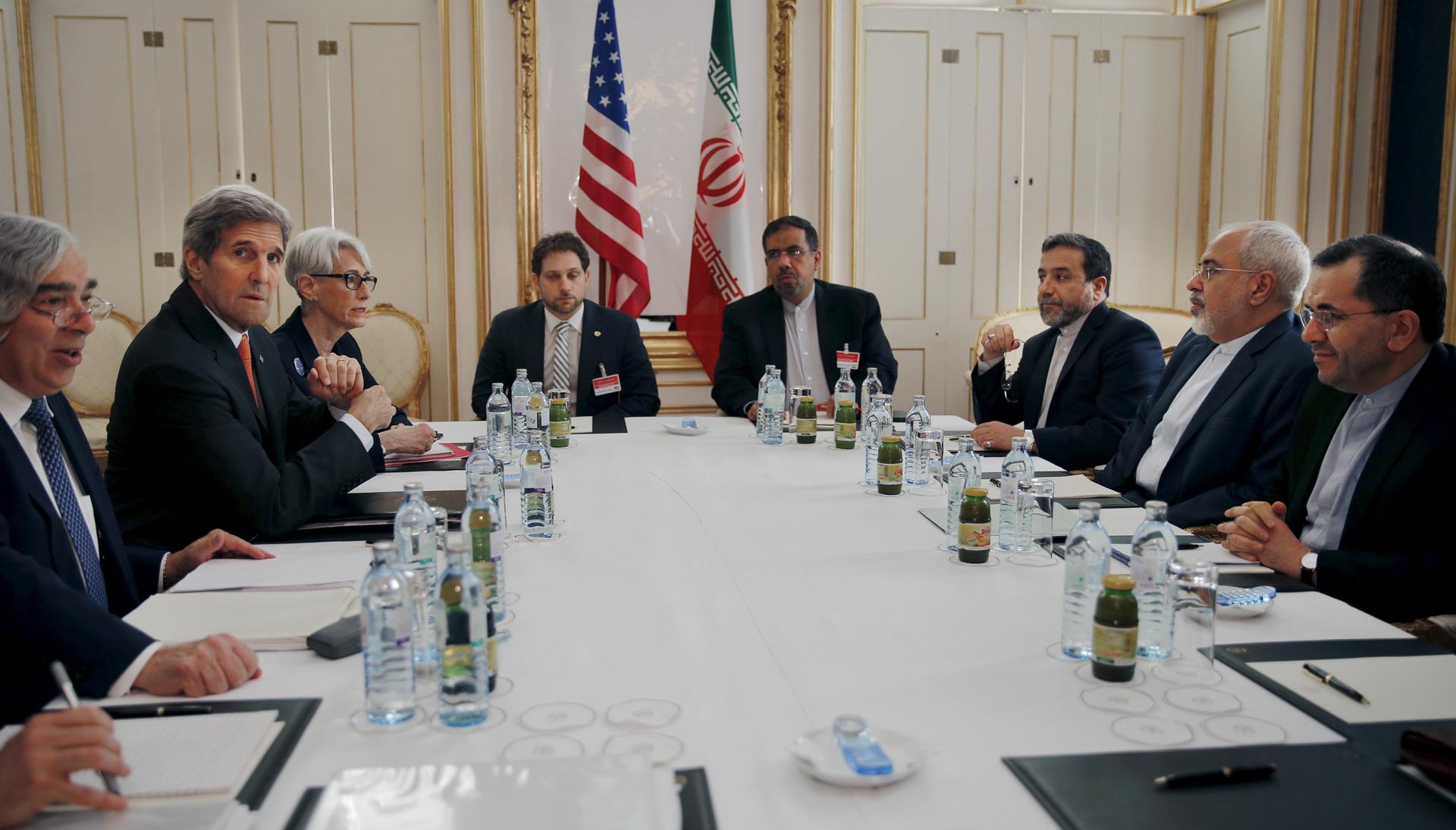 U.S. Secretary of Energy Ernest Moniz, U.S. Secretary of State John Kerry and U.S. Under Secretary for Political Affairs Wendy Sherman (L-3rd L) meet with Iranian Foreign Minister Mohammad Javad Zarif (2nd R) at a hotel in Vienna, Austria June 28, 2015.