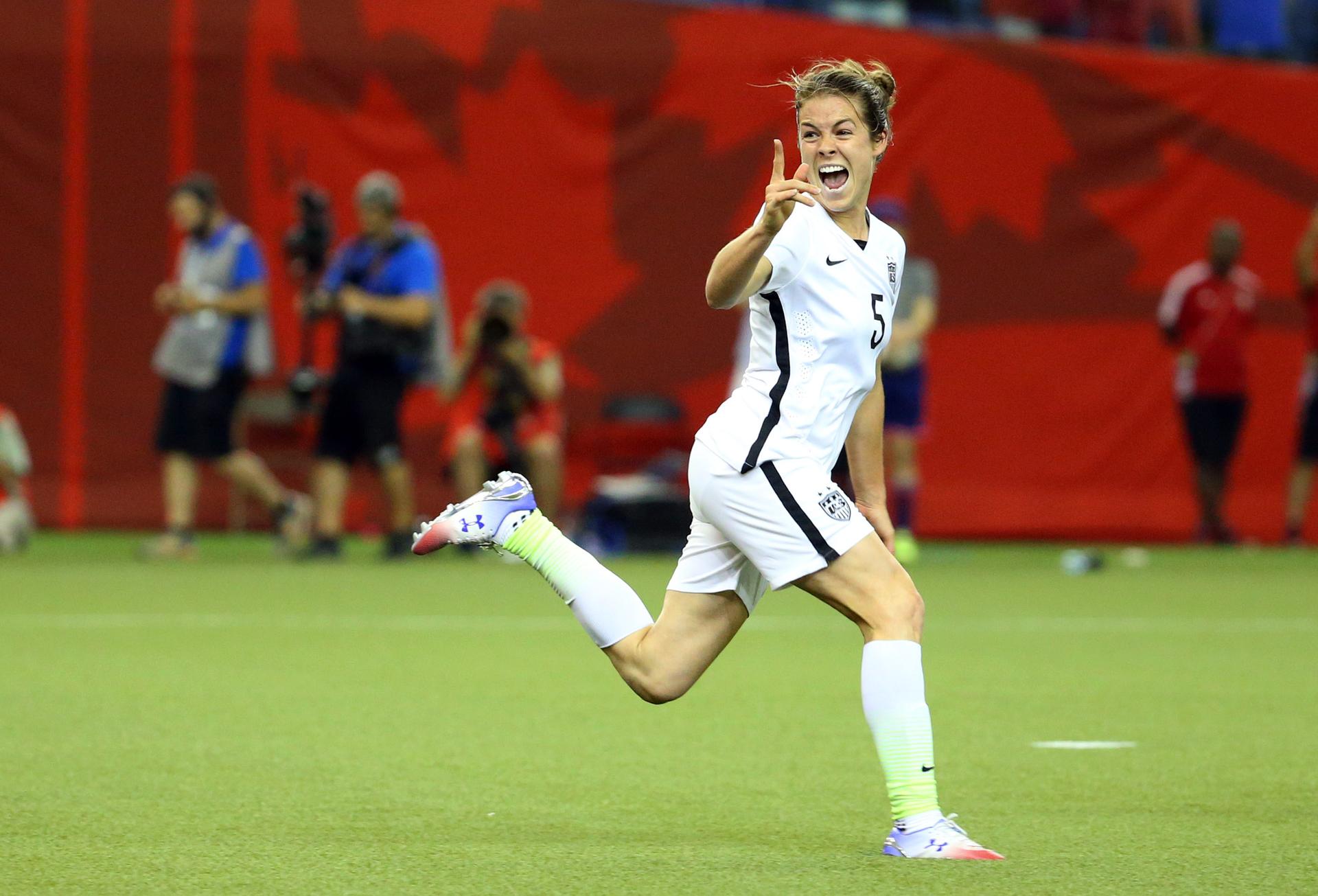 Kelley O'Hara of the US Women's soccer team celebrates her one-touch goal in the 2-0 semifinal victory over Germany. The US advances to the Women's World Cup finals on Sunday in Vancouver