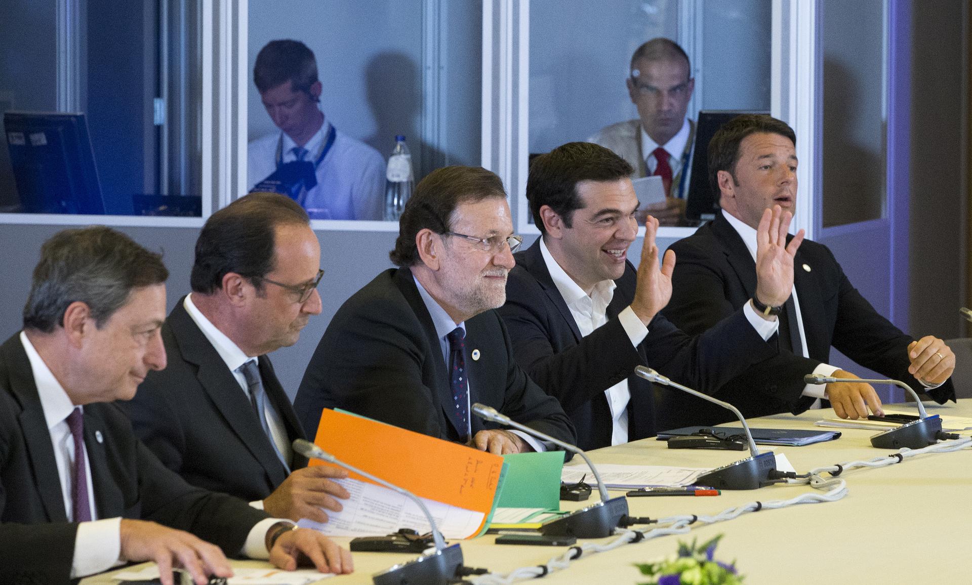 European Central Bank President Mario Draghi, French President Francois Hollande, Spanish Prime Minister Mariano Rajoy, Greek Prime Minister Alexis Tsipras and Italian Prime Minister Matteo Renzi take part in a euro zone EU leaders emergency summit.