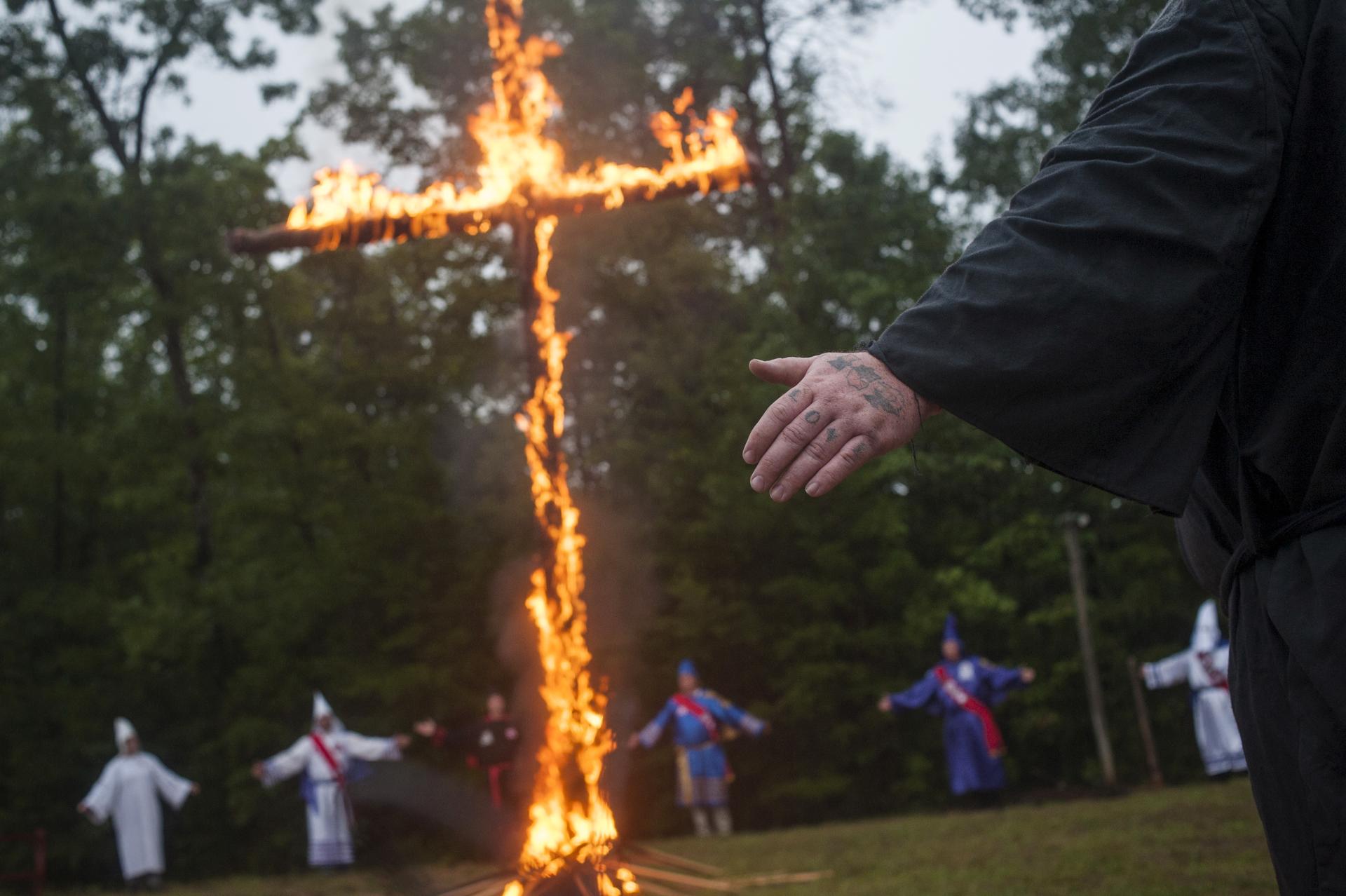 Members of the Nordic Order Knights and the Rebel Brigade Knights, groups that both claim affiliation with the Ku Klux Klan, in a cross lighting ceremony on a fellow member's property in Henry County, Virginia, August 9, 2014.