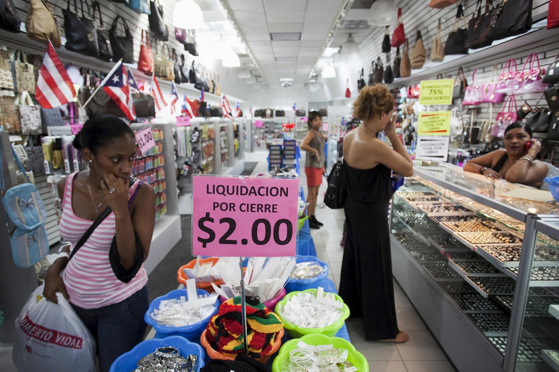People shop in a store in San Juan, Puerto Rico, August 3, 2015.