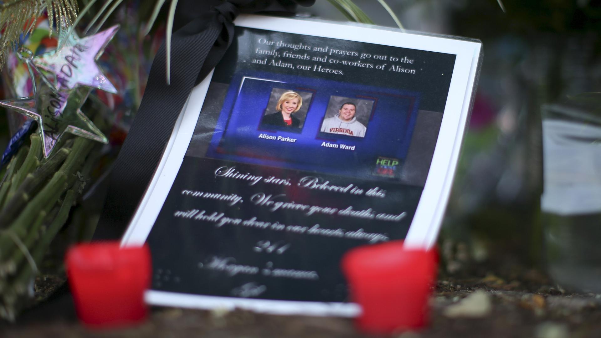 A picture of the slain journalists at a memorial outside of WDBJ7
