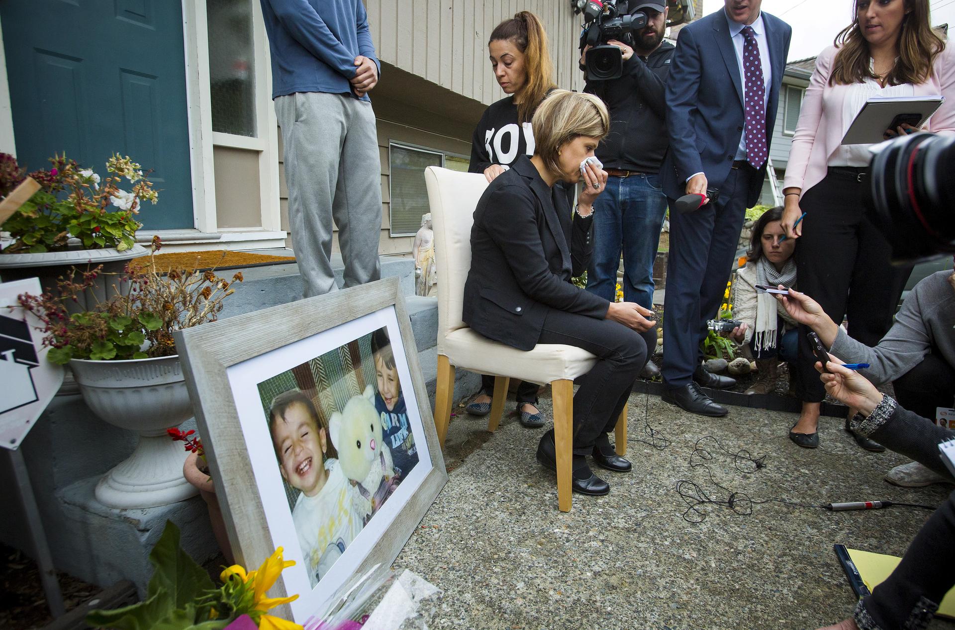 Tima Kurdi, sister of Syrian refugee Abdullah Kurdi whose sons Aylan and Galip and wife Rehan were among 12 people who drowned in Turkey trying to reach Greece, cries while speaking to the media outside her home in Coquitlam, British Columbia. A photograp