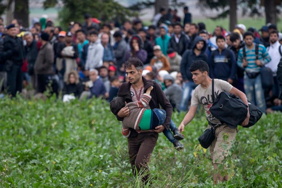 In this photo, migrant families had just crossed the border from Serbia to Croatia, on Sept. 24, 2015. 