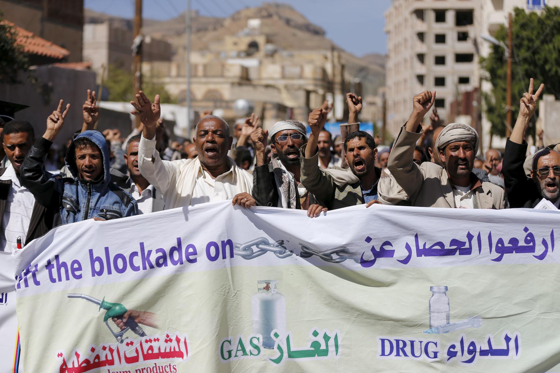 Protesters demonstrate against the Saudi-led air strikes outside the United Nations offices in Yemen's capital Sanaa