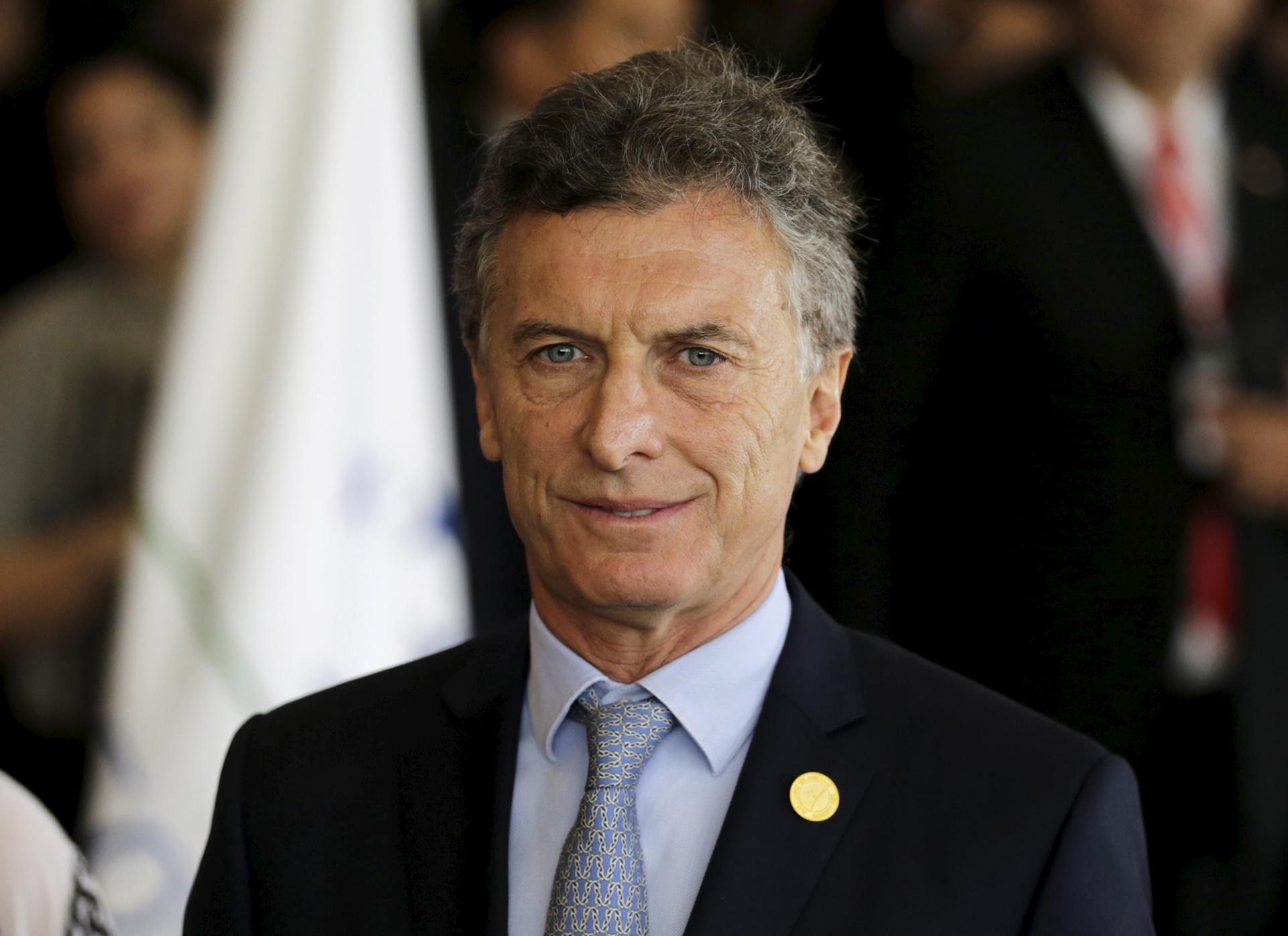 Argentina's President Mauricio Macri arrives for a session of the Summit of Heads of State of MERCOSUR and Associated States and 49th Meeting of the Common Market Council in Luque, Paraguay, December 21, 2015.