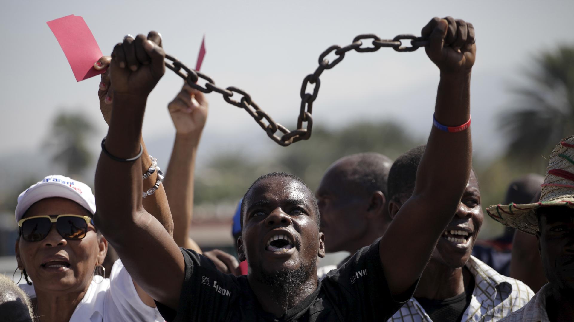 A demonstration on Monday outside of Parliament in Port-au-Prince, Haiti. Supporters of the Movement of Freedom of Liberty for the Haitian Brotherhood was protesting what it calls foreign interference and ‘occupation.’ 
