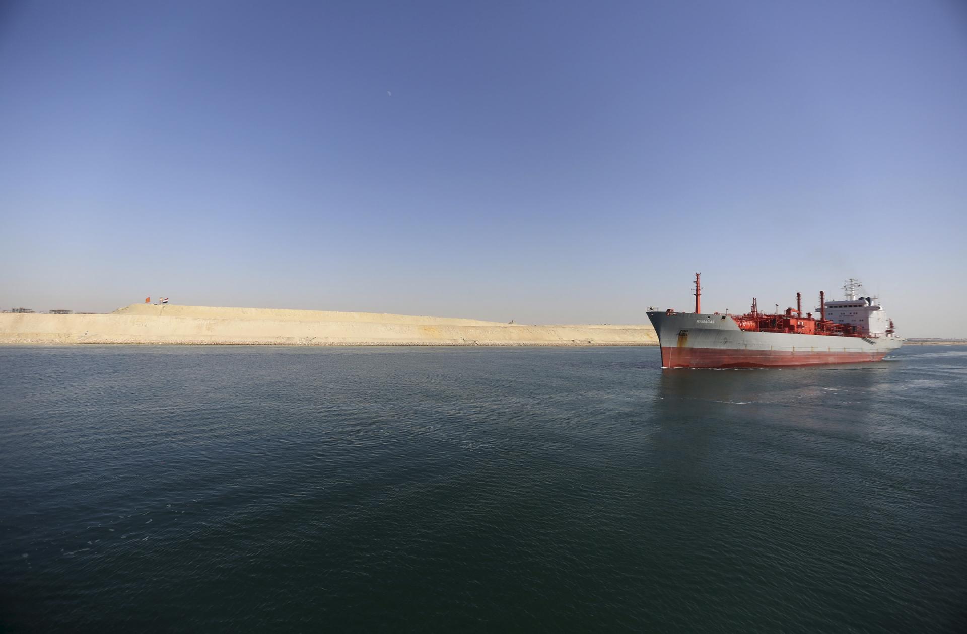 A cargo ship passing through the New Suez Canal