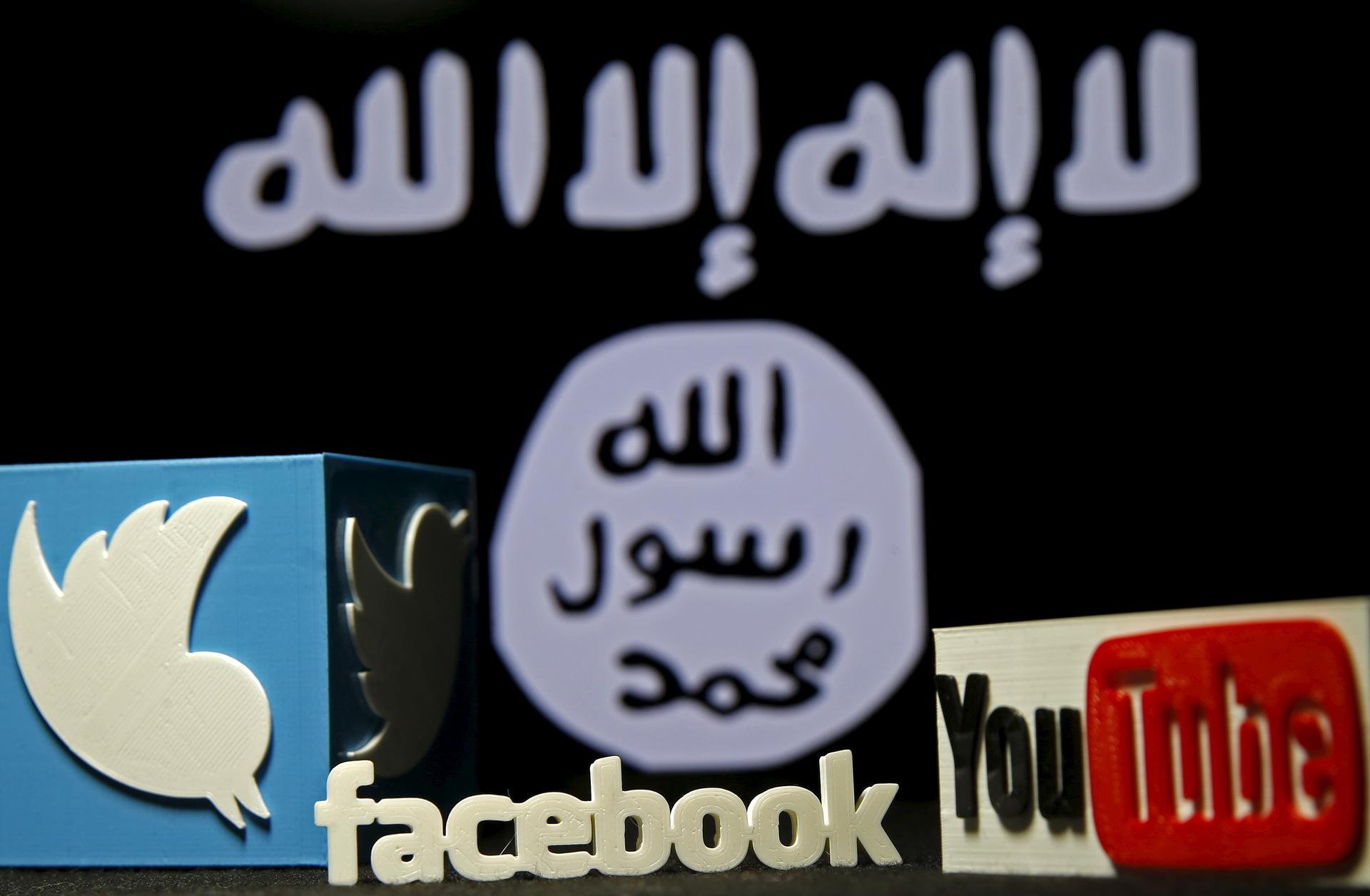 The ISIS flag next to symbols of Twitter and Facebook