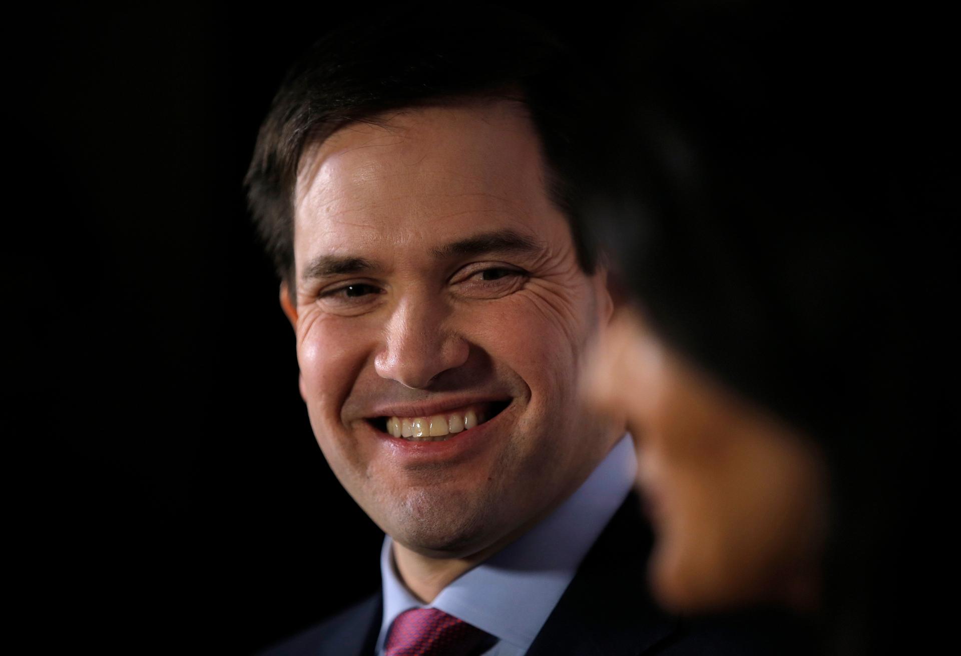U.S. Republican presidential candidate Marco Rubio smiles as South Carolina Governor Nikki Haley speaks to reporters before a campaign event in Anderson, South Carolina February 18, 2016.