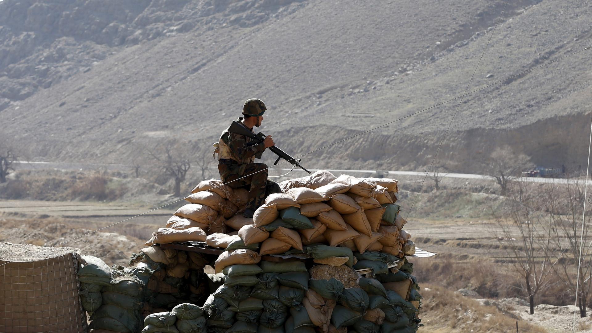 An Afghan National Army soldier keeping watch at a post in Logar province, Afghanistan, earlier this year.