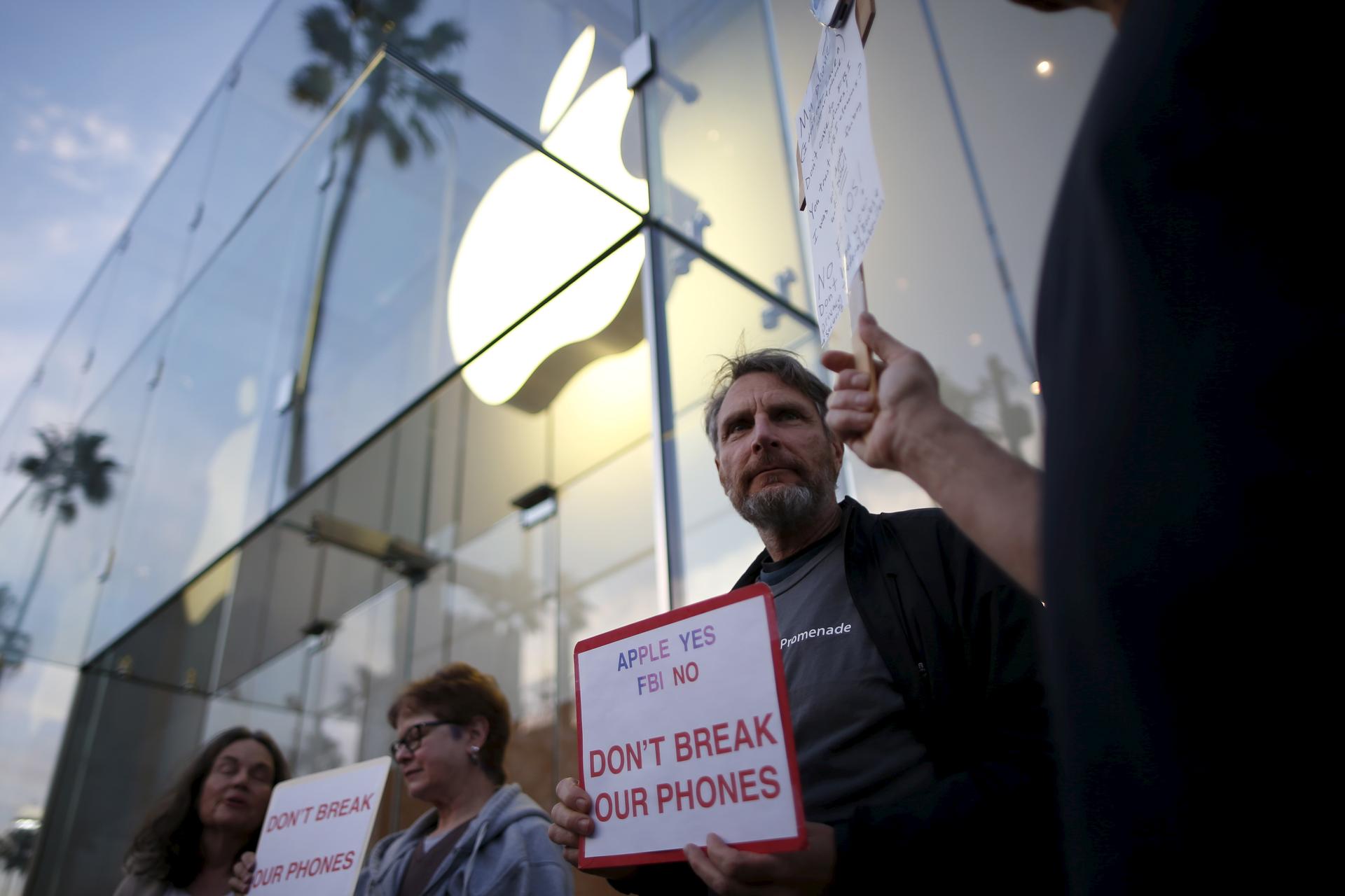 Protestors gathered at a small rally in support of Apple's refusal to help the FBI access the cell phone of a gunman involved in the killings of 14 people in San Bernardino, California in February.