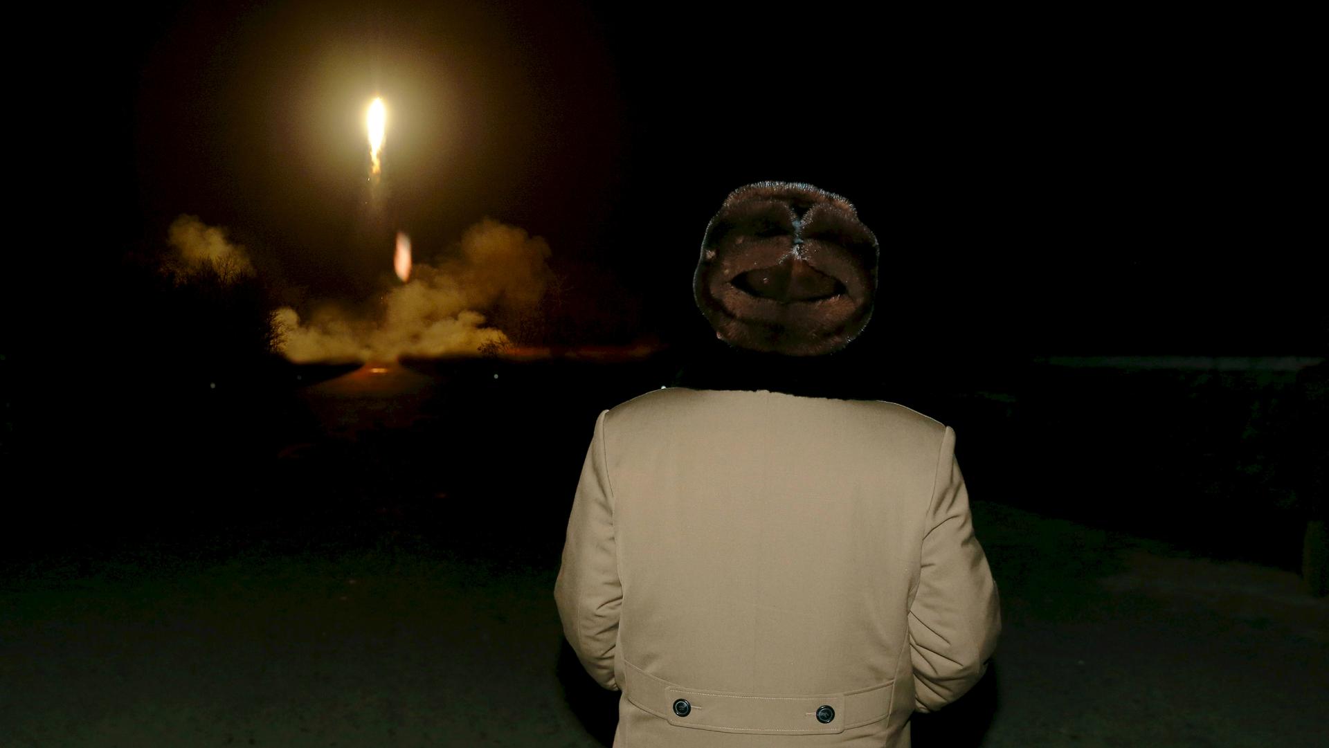 North Korean leader Kim Jong-un watches the ballistic missile test at an unknown location, in this undated file photo released by North Korea's Korean Central News Agency in Pyongyang on March 11, 2016. 