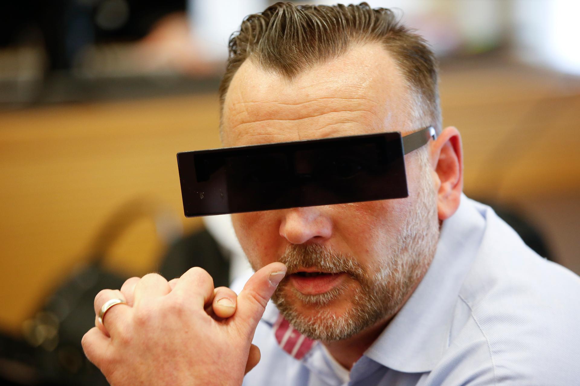 Lutz Bachmann, co-founder of Patriotic Europeans Against the Islamisation of the West (PEGIDA), waits in a courtroom for his trial to be charged with incitement over Facebook posts in a court in Dresden, Germany, April 19, 2016. 