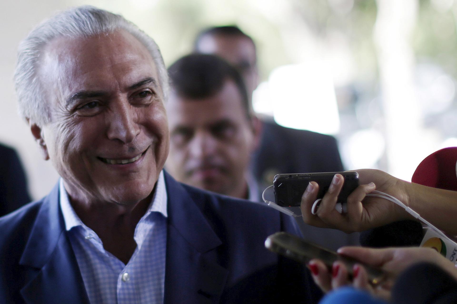 Michel Temer is Brazil's acting president. Will Brazilians trust that smile?