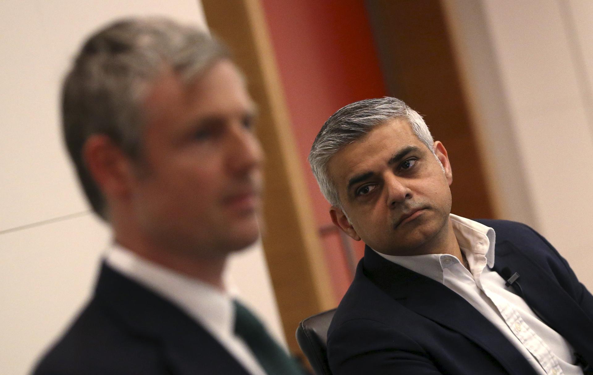 Britain's Labour Party candidate for Mayor of London, Sadiq Khan (R) looks at Conservative party candidate Zac Goldsmith during a hustings event in London, Britain March 23, 2016.