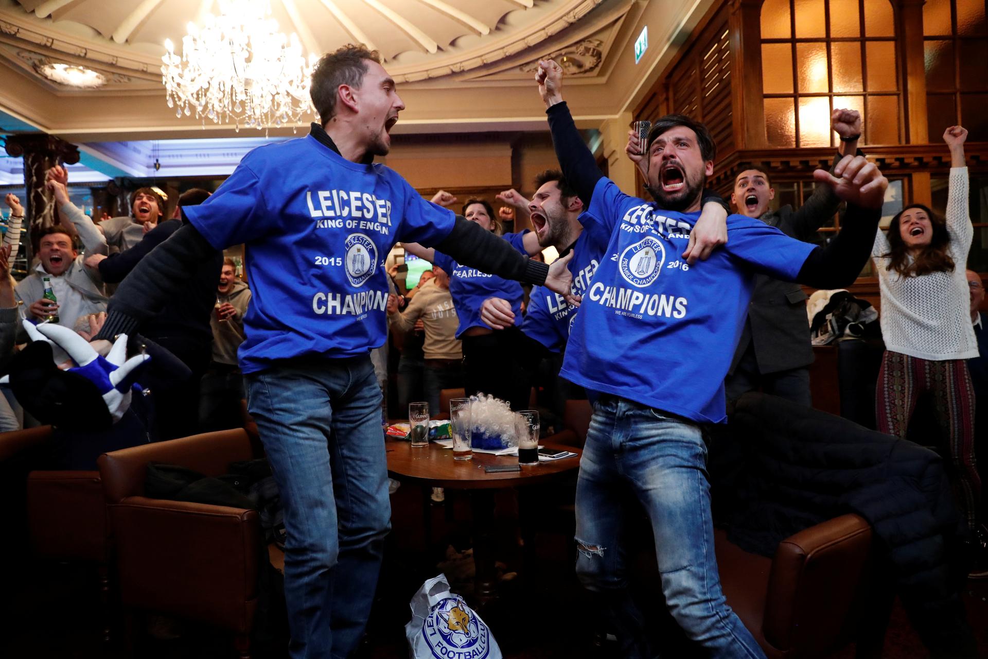 Leicester City fans watch the Chelsea v Tottenham Hotspur game in pub in Leicester.