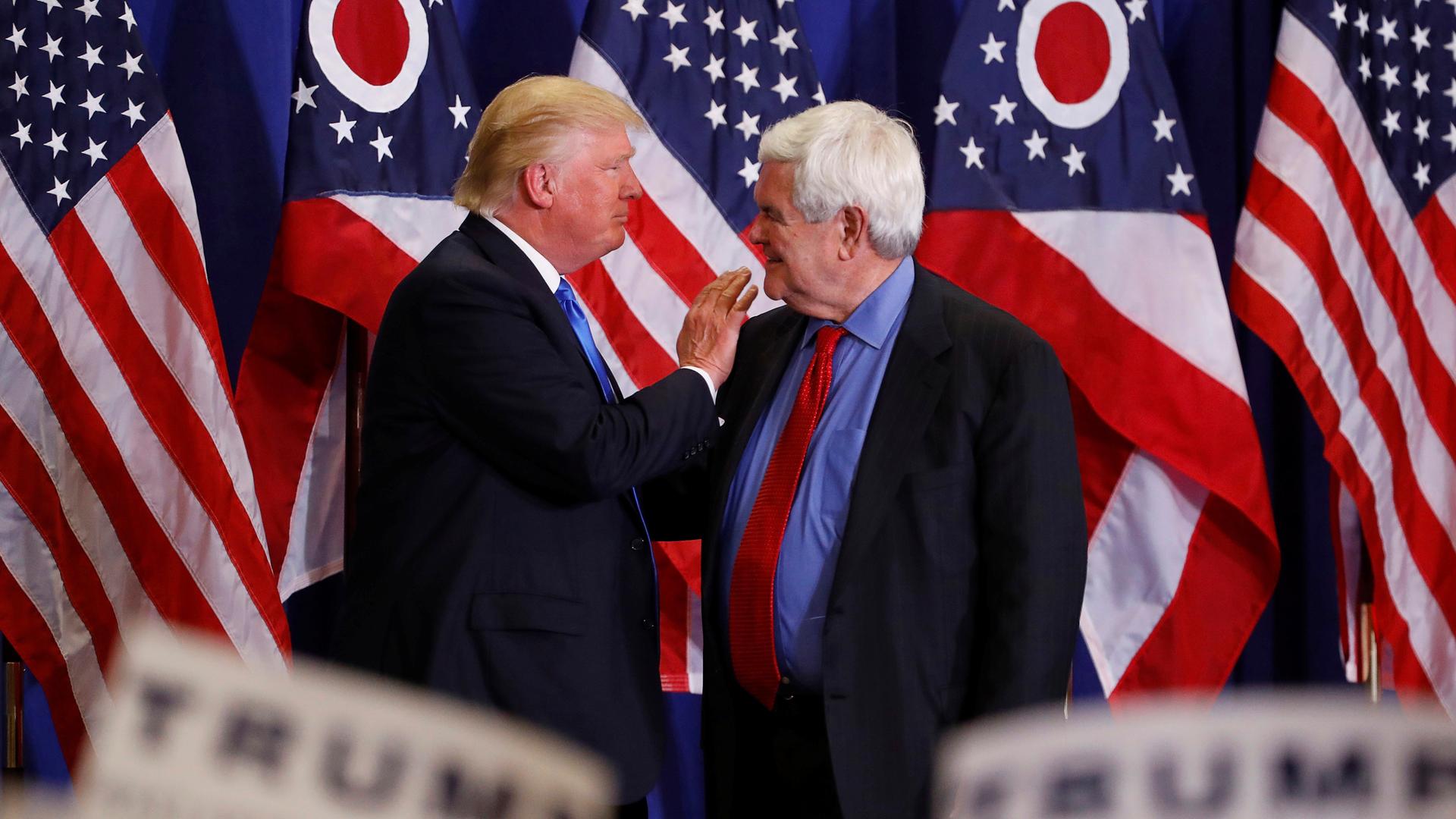 Former Speaker of the House Newt Gingrich greets U.S. Republican presidential candidate Donald Trump at a rally at in Cincinnati, Ohio on July 6, 2016.