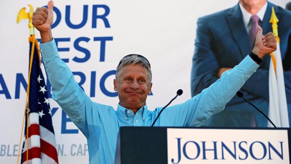 Libertarian presidential candidate Gary Johnson gives two thumbs up to the crowd after speaking at a campaign rally in Boston on Aug. 27.