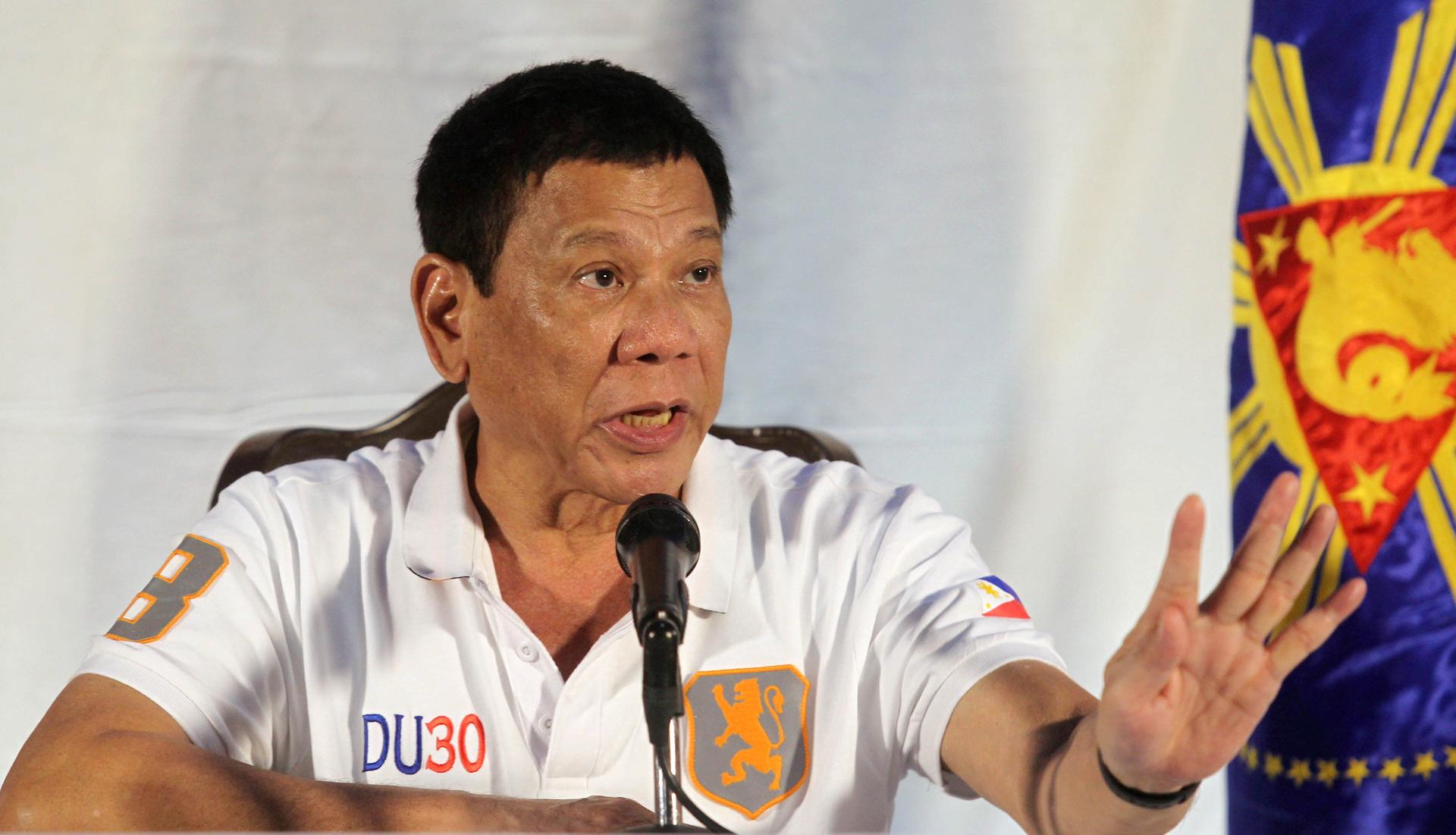 Philippine President Rodrigo Duterte speaks during a news conference in Davao city. 