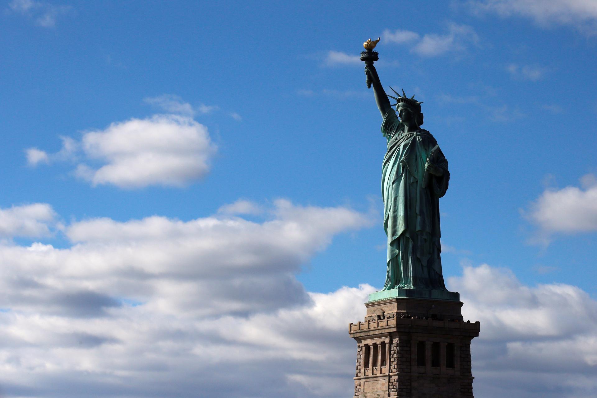 The Statue of Liberty is seen on the 130th anniversary of the dedication in New York Harbor, in New York City.