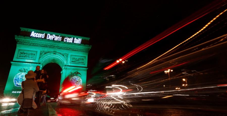 The Arc de Triomphe is illuminated in green with the words "Paris Agreement is Done" to celebrate the United Nations climate change agreement in Paris, France, on Nov. 4.