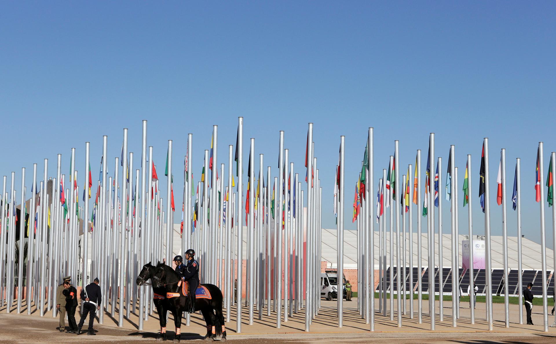 Moroccan security stand guard in front of the entrance of the UN Climate Change Conference 2016 (COP22) in Marrakech, Morocco, November 14, 2016.