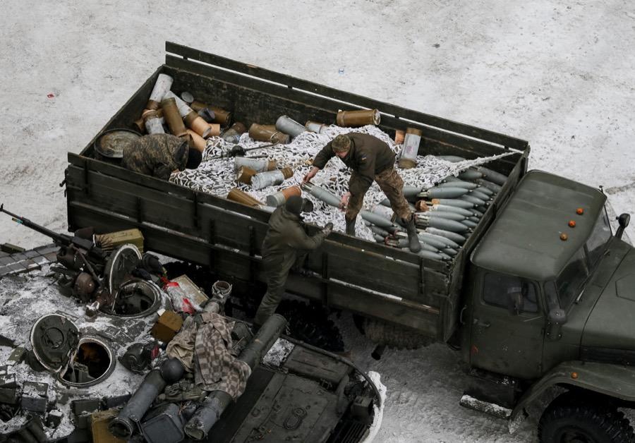 Crew members prepare tanks in the government-held industrial town of Avdiivka, Ukraine, on Feb. 2.