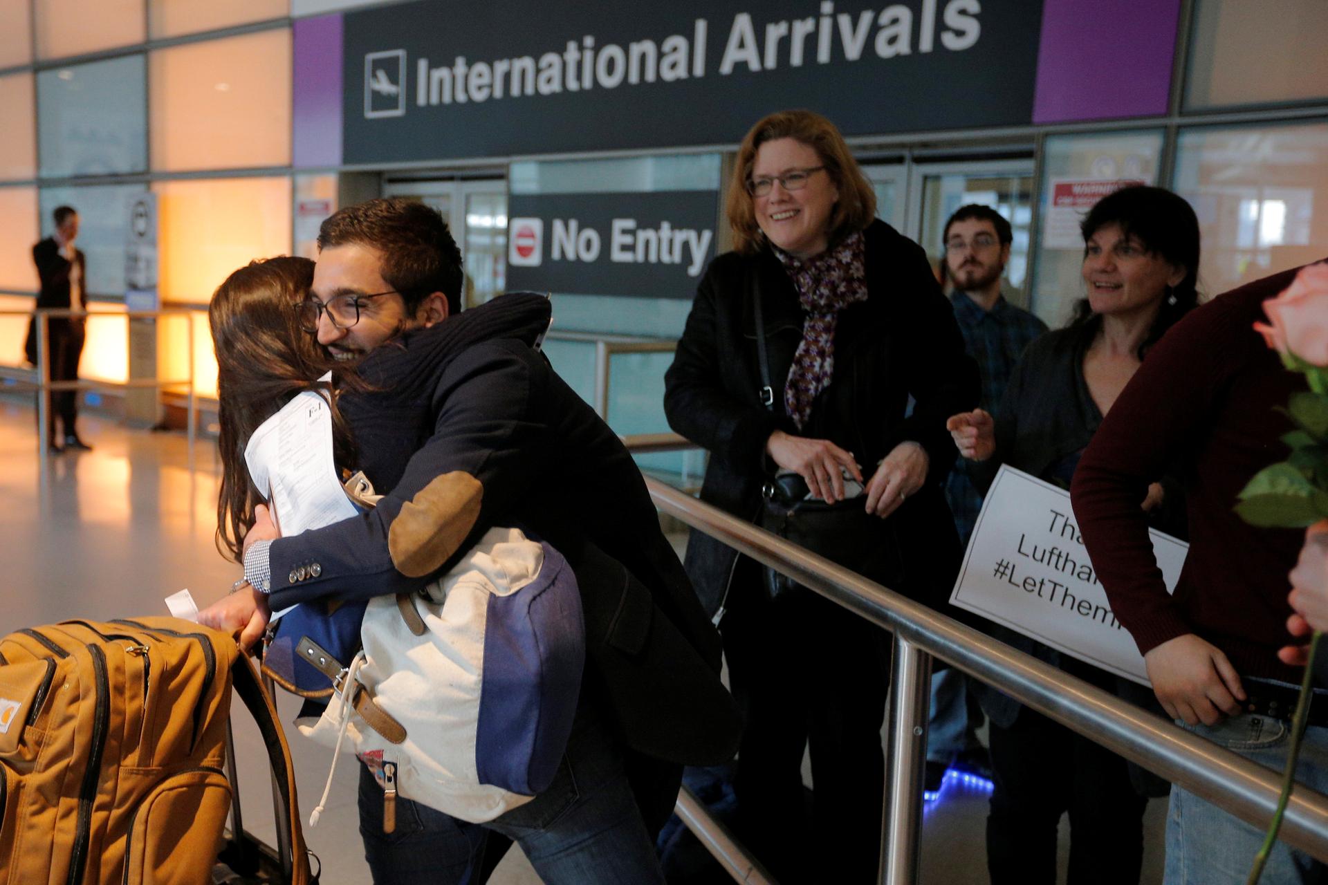 Behnam Partopour, a Worcester Polytechnic Institute (WPI) student from Iran, is greeted by his sister Bahar (L) at Logan Airport after he cleared U.S. customs and immigration on an F1 student visa in Boston, Massachusetts, U.S. February 3, 2017. Partopour