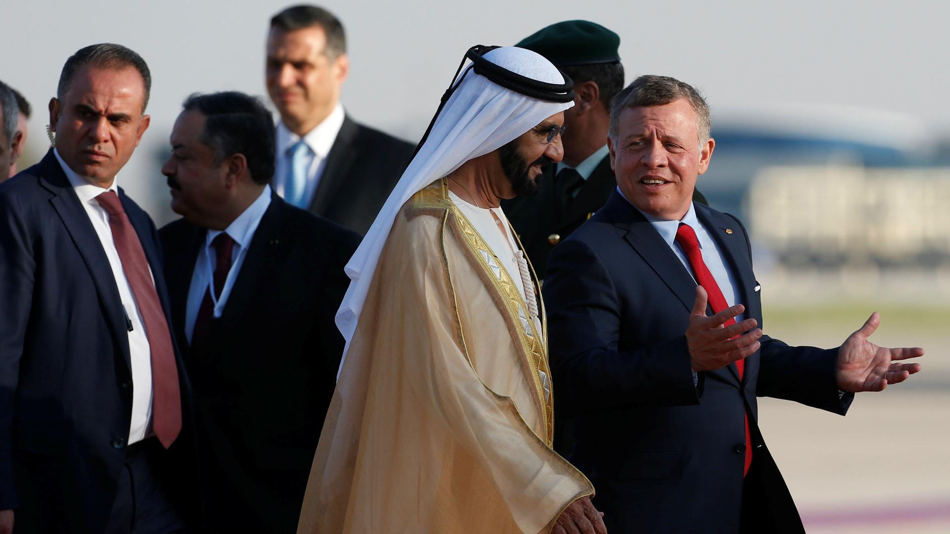 Jordan's King Abdullah II welcomes Prime Minister and Vice-President of the United Arab Emirates and ruler of Dubai Sheikh Mohammed bin Rashid al-Maktoum during a reception ceremony at the Queen Alia International Airport in Amman, Jordan, March 28, 2017.