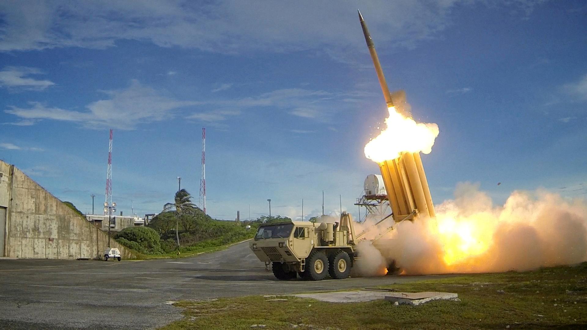 It looks cool, but does it work? A Terminal High Altitude Area Defense (THAAD) interceptor is launched during a test, in this undated photo provided by the Pentagon’s Missile Defense Agency. 