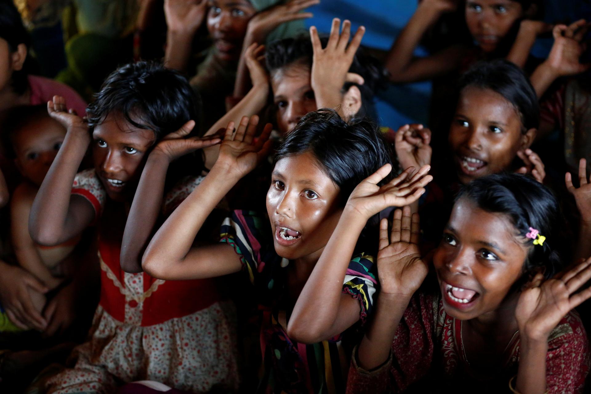 Rohingya refugee children attend a makeshift school at Balukhali Makeshift Refugee Camp in Cox's Bazar, Bangladesh.