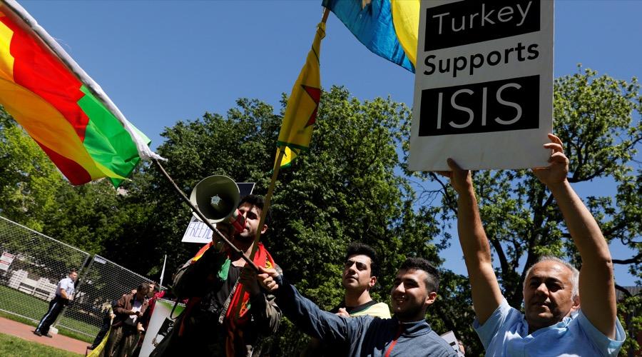 A group of Kurdish protesters shout slogans against the government of Turkish President Recep Tayyip Erdogan in Washington, DC's Lafayette Park on May 16.