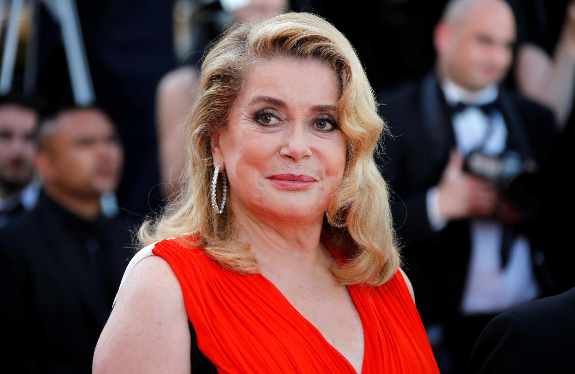 Actress Catherine Deneuve poses at the 70th Cannes Film Festival.