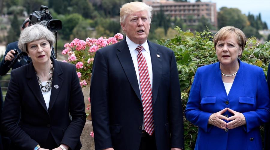 Britain's Prime Minister Theresa May, US President Donald Trump and German Chancellor Angela Merkel
