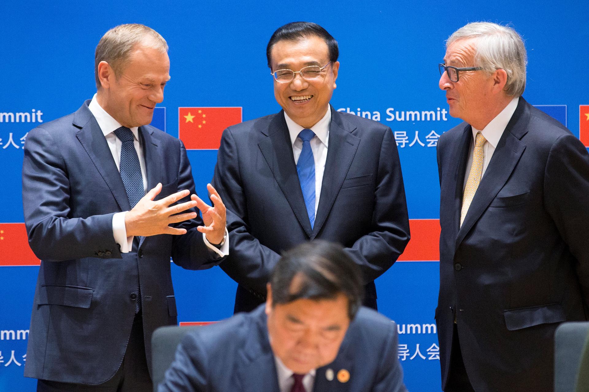 European Council President Donald Tusk, Chinese Premier Li Keqiang and EU Commission President Jean-Claude Juncker attend a signing ceremony during a EU-China Summit in Brussels, Belgium June 2, 2017.
