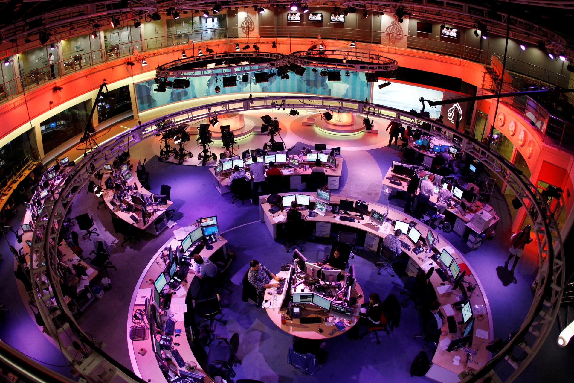 A general view shows the newsroom at the headquarters of the Qatar-based Al Jazeera English-language channel in Doha February 7, 2011.