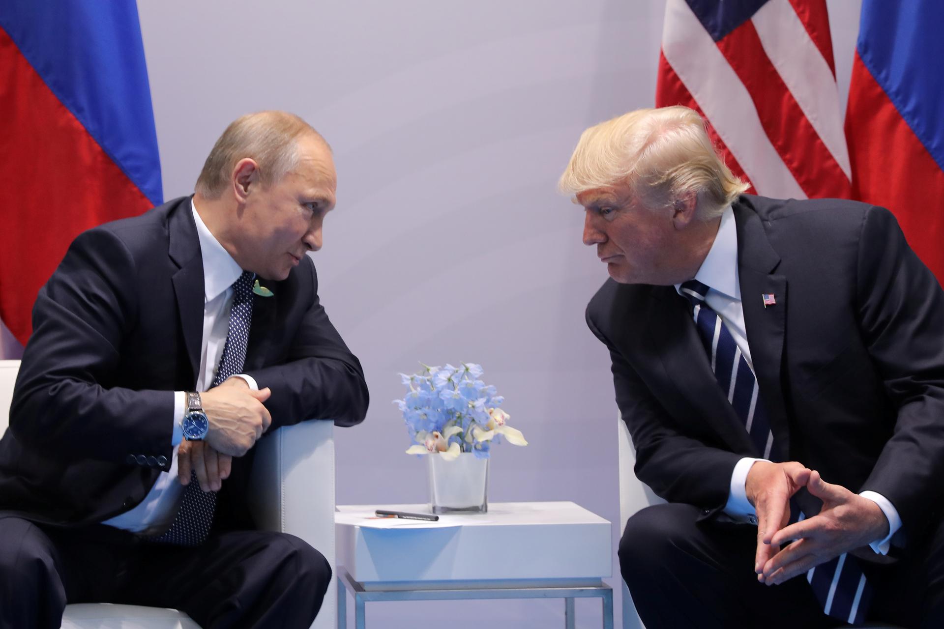 Russia's President Vladimir Putin talks to U.S. President Donald Trump during their bilateral meeting at the G20 summit in Hamburg.