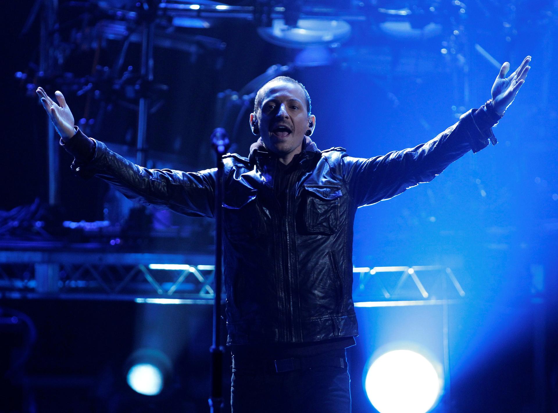 Chester Bennington of Linkin Park performs "Burn It Down" at the 40th American Music Awards in Los Angeles, California, November 18, 2012.