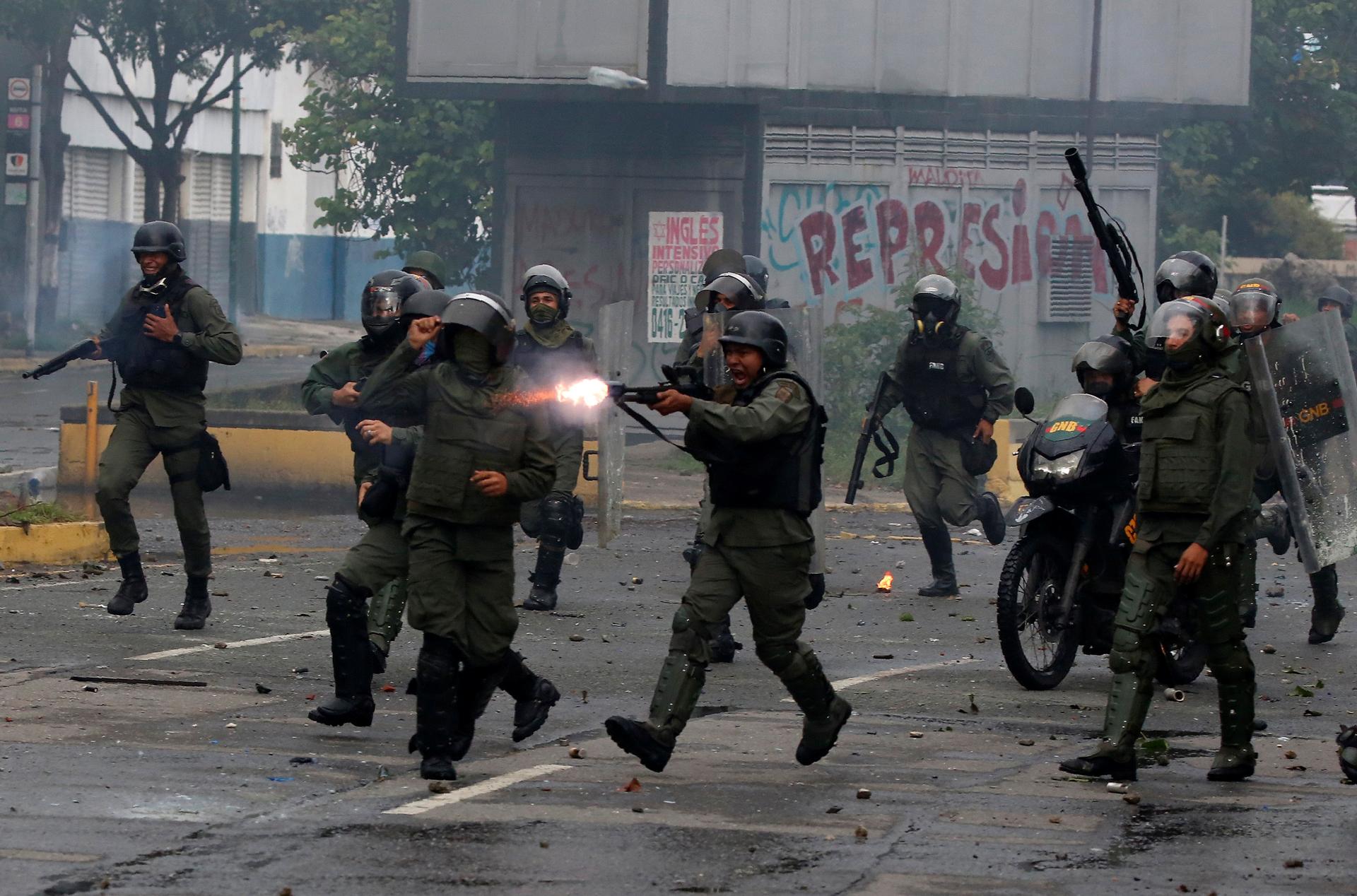 Riot security forces clashing with demonstrators rallying against Venezuela's President Nicolás Maduro's government in Caracas, Venezuela, on July 28.