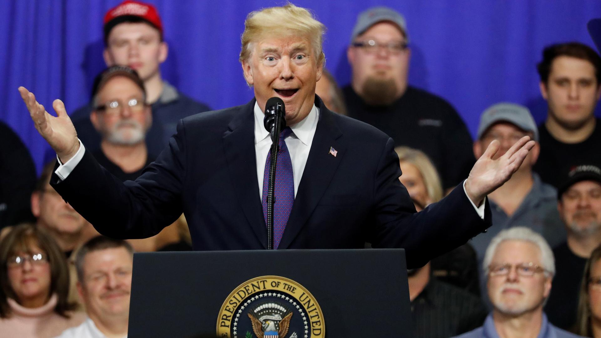 President Trump delivers a speech after touring a factory near Cincinnati, Ohio, Monday